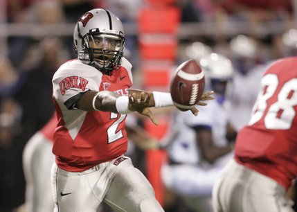 UNLV quarterback Omar Clayton pitches a lateral during the first half of Saturday's game against Air Force. 
