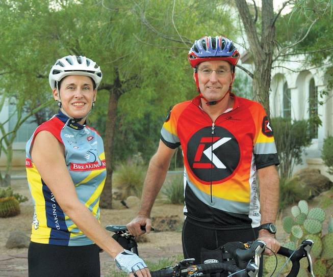 Don and Michele Shafe pose for a photo before a training session for the 118-mile RTC Viva Bike Vegas ride this Saturday.
