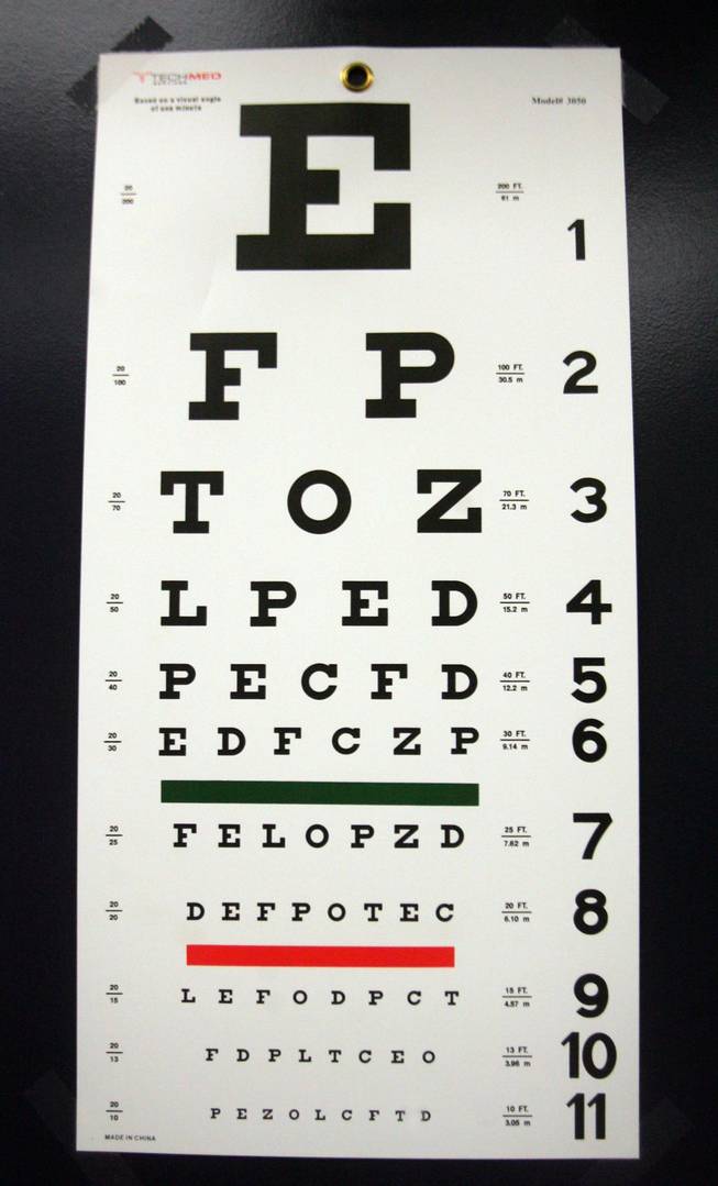 An eye chart hangs on a door at the student health clinic in the parking lot of Basic High School. Basic and Nevada State College have a partnership to operate the clinic, which is opened to students of all ages from anywhere in Henderson.  
