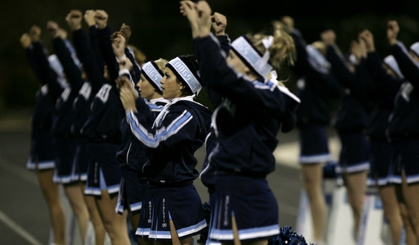 Centennial cheerleaders pull for their team after a Bulldogs touchdown.