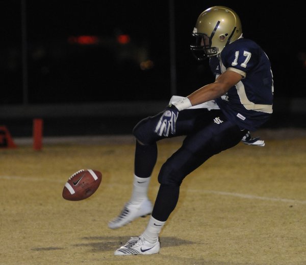 Spring Valley's Alex Quintero punts away the ball in the ...