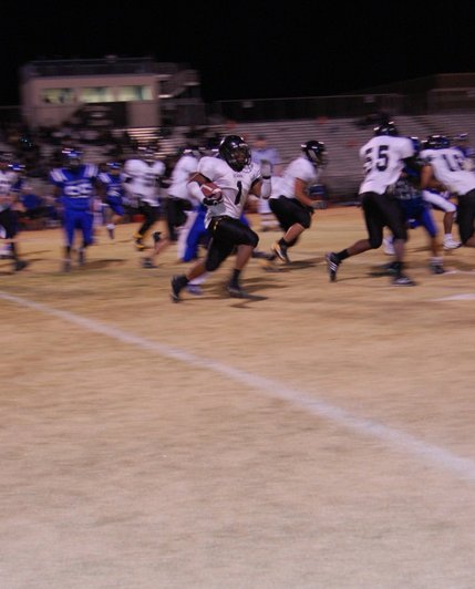 Clark junior running back Andre Clay rushes the ball during the fourth quarter. Clay rushed for 92 yards on 23 carries and had a 1-yard touchdown run in the first quarter Friday night. 
