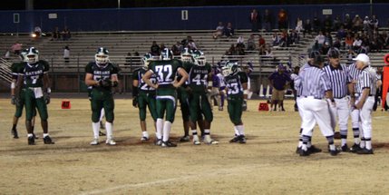 Referees discuss a play at Friday's game. Green Valley went on to beat Silverado, 31-13.