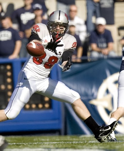UNLV's Ryan Wolfe (88) catches a pass against BYU during the first quarter of last October's 42-35 Rebels loss in Provo.