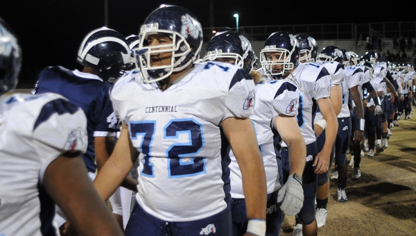 Centennial and Shadow Ridge players shake hands after Friday night's ...