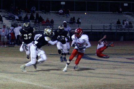 Arbor View's DeMon Scurry (3) tries to avoid Cheyenne's Khyriece Campbell (5) during Friday's game.