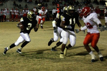 Cheyenne's Marcus Sullivan runs the ball during Friday's game against Arbor View.