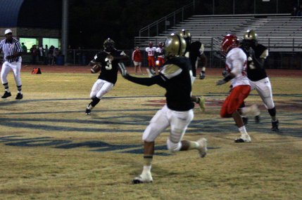 Cheyenne's Marcus Sullivan gets ready to pass the ball to Jordan Butler during Friday's game against Arbor View.