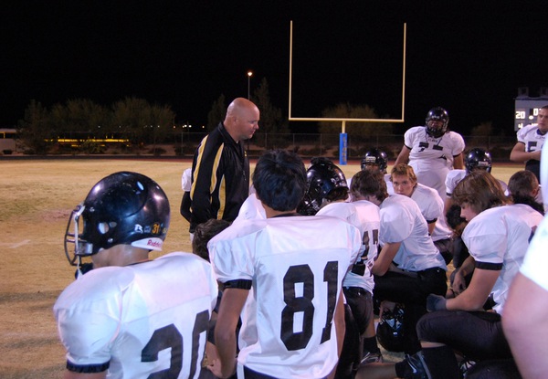Clark head coach Don Willis talks to his players after ...