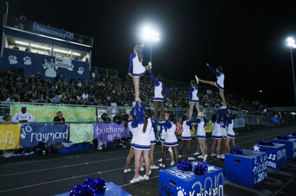 Basic cheerleaders build a tower during Friday's game against Del Sol.