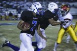 Basic's Robby Faiman (7), the Home News Player of the Year, runs the ball against Del Sol. Faiman led the Wolves to the Southeast Division title and the Sunrise Regional semifinals