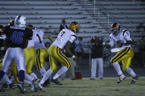 Del Sol's Saei Huihui (9) pitches the ball to Earnest ...
