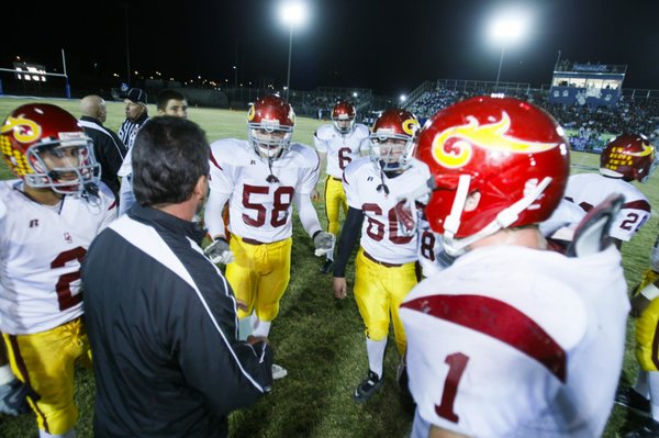 Del Sol coach Preston Goroff talks to his team during ...