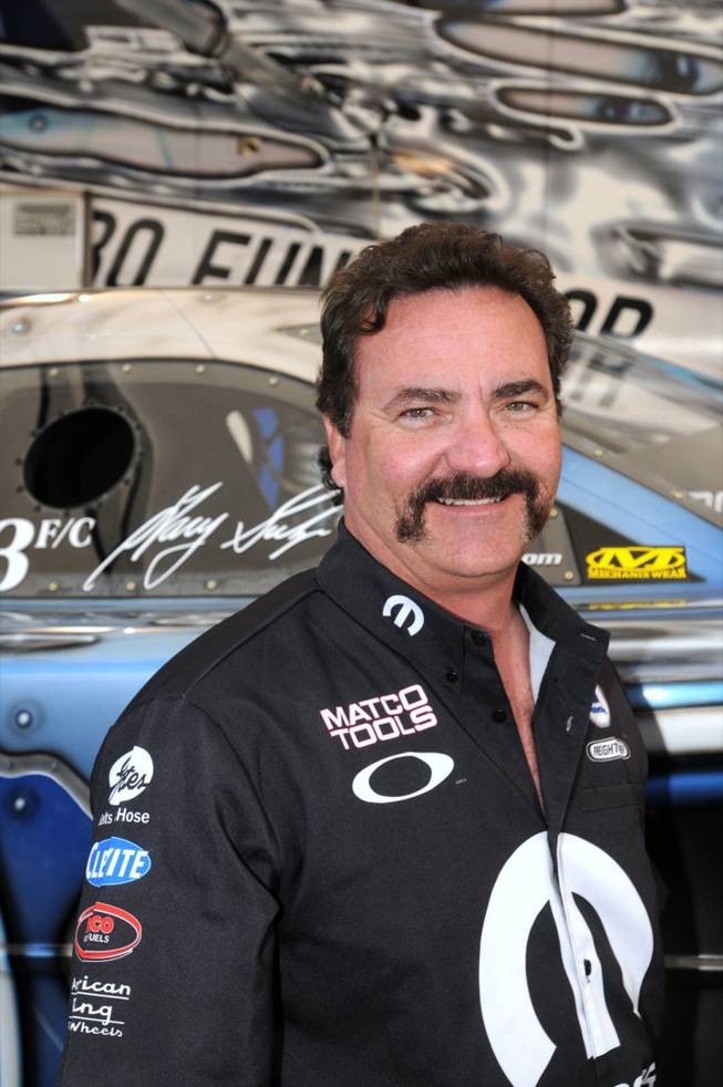 Four-time National Hot Rod Association Funny Car driver Gary Scelzi is teetering on retirement as the NHRA rolls in to Las Vegas Motor Speedway this weekend.