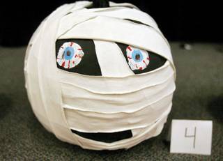 A pumpkin decorated as a mummy is just one of the entries in the pumpkin carving contest at Aggie Roberts Elementary School's annual Fall Festival on Oct. 24.  
