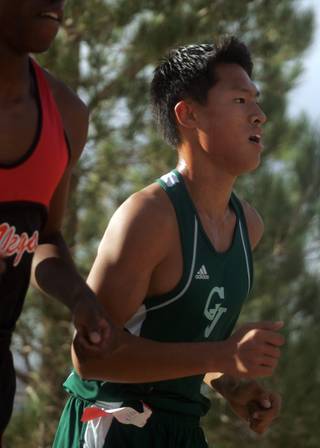 Green Valley's Julius Kim sprints ahead during the Sunrise region boys Cross Country Championships at Veteran's Memorial Park on Friday. The Green Valley boys team took first place.  