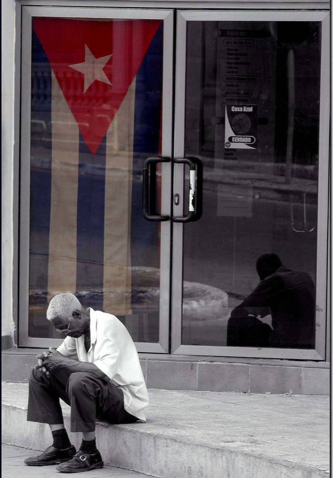 One of Maria and Eugenio Lopez's photos from Cuba: "Hope." A resident of Las Tunas waiting for a store to open. The photograph symbolizes the Cuban people's hope of an "opening" of their country to the rest of the world, meaning political change and freedom of expression.