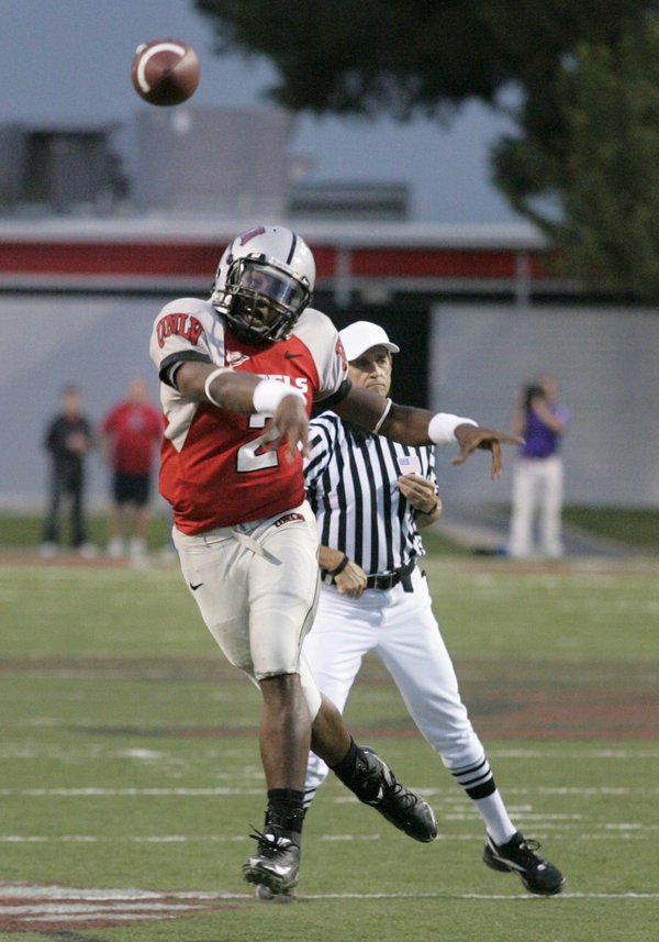 UNLV quarterback Omar Clayton lets loose with a pass during ...