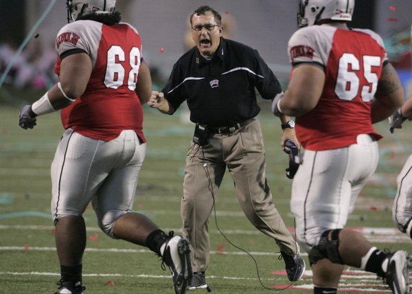 UNLV head coach Mike Sanford cheers his team after it ...