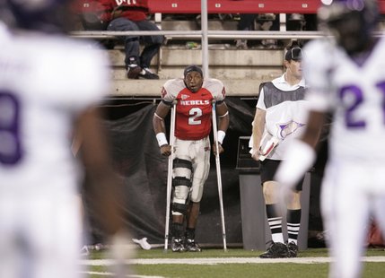 UNLV starting quarterback Omar Clayton watches the game against TCU after injuring his knee Saturday.