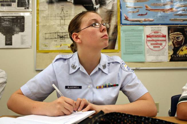 Air Force ROTC sophomore Alexis Blackwell takes notes during an aviation systems class at Rancho. Principals at schools including Rancho are meeting with parents to discuss anticipated budget cuts.