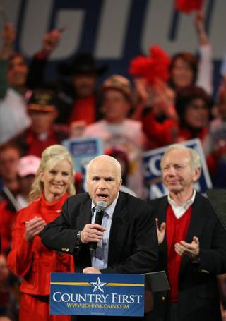 Republican presidential nominee Sen. John McCain, R-Ariz., gives a thumbs-up as he arrives for a rally at the Henderson Pavilion in Henderson, Nev., Nov. 3, 2008. 