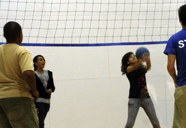 Maria Estavez gets hits the ball while playing walleyball, one of the many activities scheduled as a part of Teen Club at the Whitney Ranch Recreational Center.