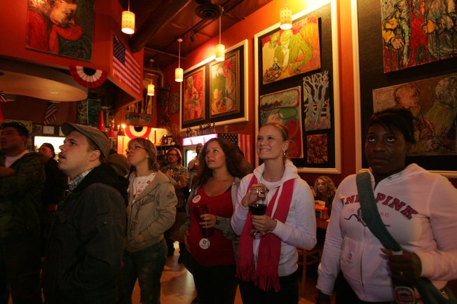 A room of mostly Obama supporters, from left, Bennett Main, Dasha Biggs, Natalie Sittler, Melisha Landreth and Bethany Townsend watch Sen. John McCain's televised concession speech during an Election Day party at the Canvas Cafe, 430 E. Silverado Ranch Blvd., on Tuesday.