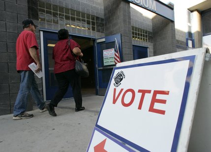 Voters make their way into the Basic High School gymnasium Tuesday.

