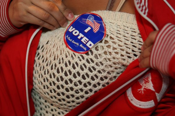 First-time voter Gemvvi Torio, 18, of Las Vegas, displays her ...