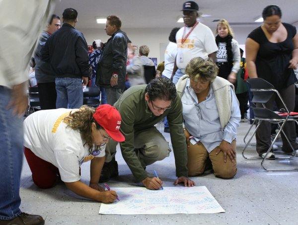 David Campana, center, and other union members sign a sympathy ...