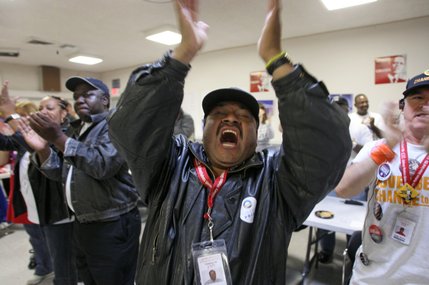 Team leader Nazario Romero, center, chants with workers during a morning meeting at the Culinary Workers Union Local 226 headquarters before a final day of election work and canvassing Tuesday, Nov. 4, 2008. 