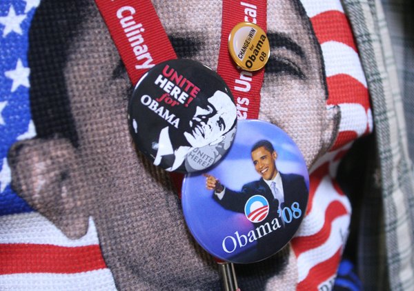 Union member Kevin Purvis wears buttons supporting Democratic presidential nominee ...