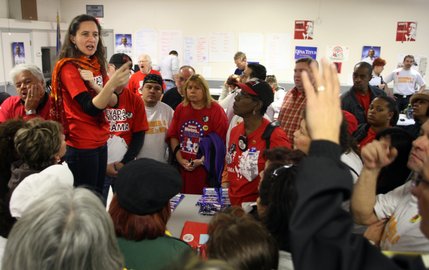 Political Director Pilar Weiss left, answers a question during a morning meeting at the Culinary Workers Union Local 226 headquarters before a final day of election work and canvassing Tuesday, Nov. 4, 2008.  
