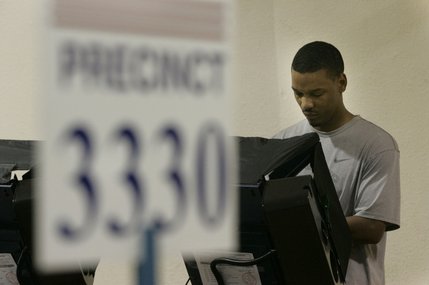 Jessie Putman casts his vote at The Lakes Lutheran Church at 12:32 p.m. Tuesday