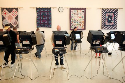  Voters cast their ballets electronically on election day at First Christian Church on South Rancho Drive in Las Vegas Tuesday.