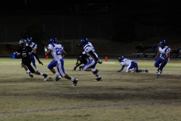 Palo Verde's Torin Harris (5) tries to avoid Sierra Vista ...