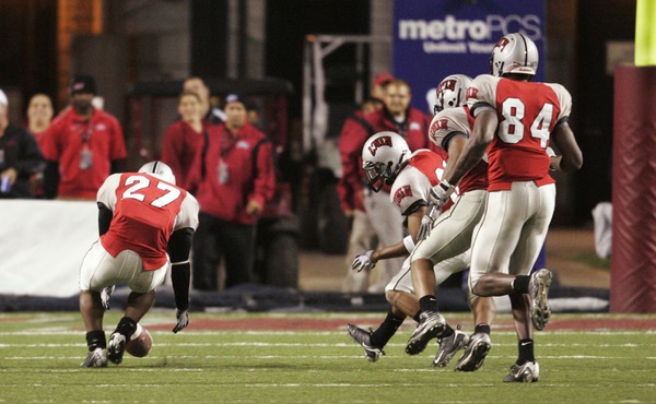 UNLV running back Chris Brogdon tries to scoop up a ...