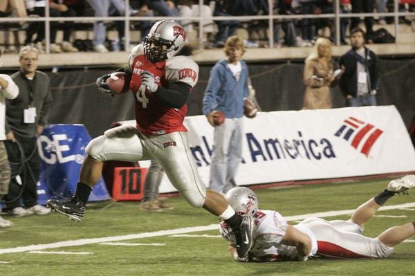 UNLV running back Frank Summers slips past New Mexico cornerback ...