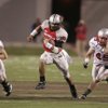 UNLV quarterback Mike Clausen finds some daylight during the game against New Mexico Saturday.
