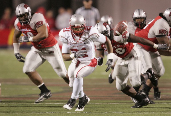 New Mexico running back Rodney Ferguson chases down a ball ...
