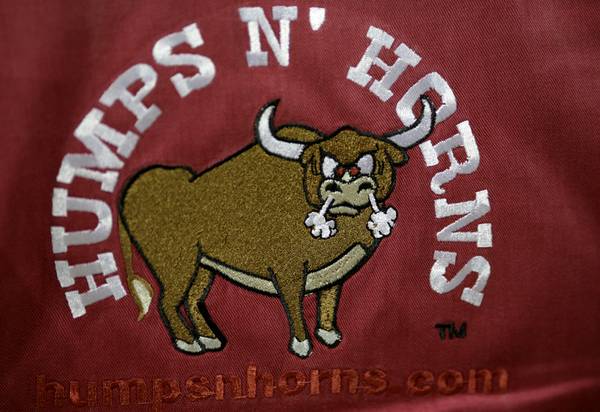 A patch on a shirt advertises a website for avid ...