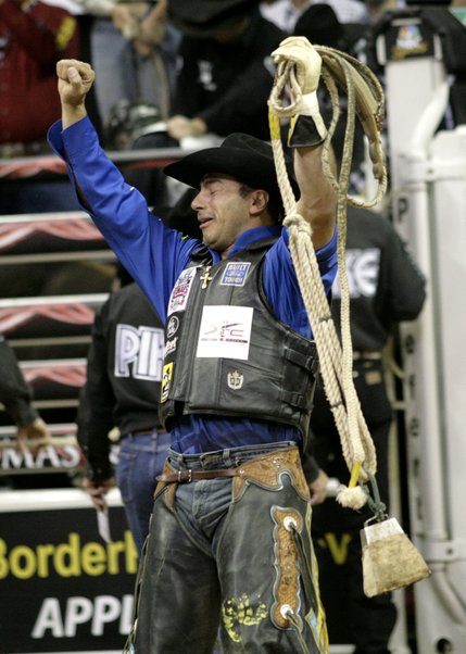 Bull riding at the final round of the PBR World Finals at the Thomas and Mack Center Sunday.  