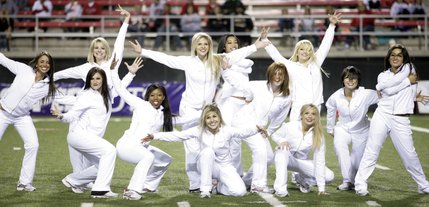 The Rebel Girls perform during a timeout.