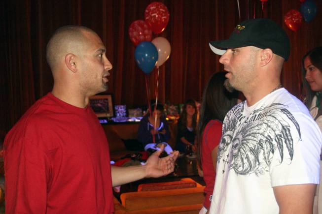 Philadelphia Phillies' outfielder and Summerlin resident Shane Victorino talks with Chicago Cubs outfielder Reed Johnson while celebrating the Phillies' 2008 World Series title at the Red Rock Casino on Sunday night.