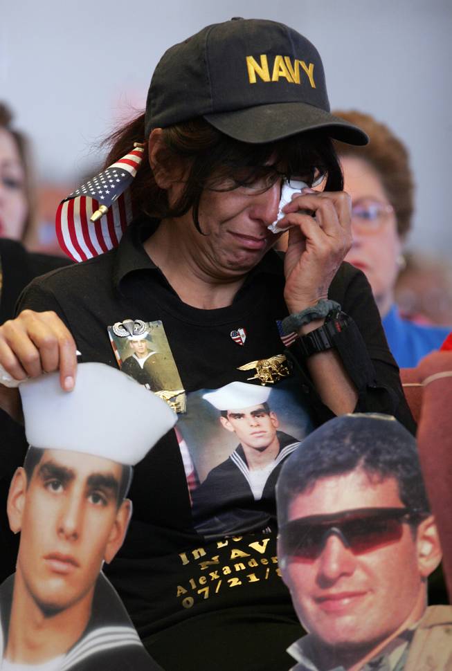 Farideh Ghane cries during the Veterans Day Ceremony Tuesday at the Southern Nevada Veterans Memorial Cemetery.  Her son, Alexander Ghane, a Navy Seal, died during a training exercise on Jan. 30.