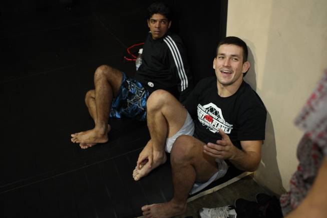 Mixed martial arts fighter Demian Maia, right, talks to reporters during a recent workout at the Xtreme Couture gym in preparation for his UFC 91 match against Nate Quarry Saturday night at the MGM Grand Garden Arena.