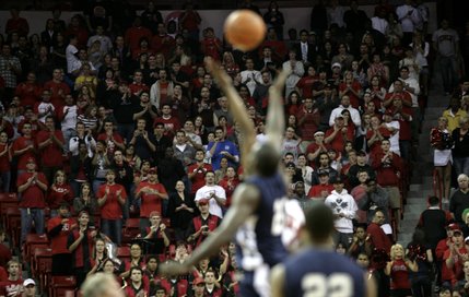 UNLV fans cheer at the tipoff of Tuesday night's game.