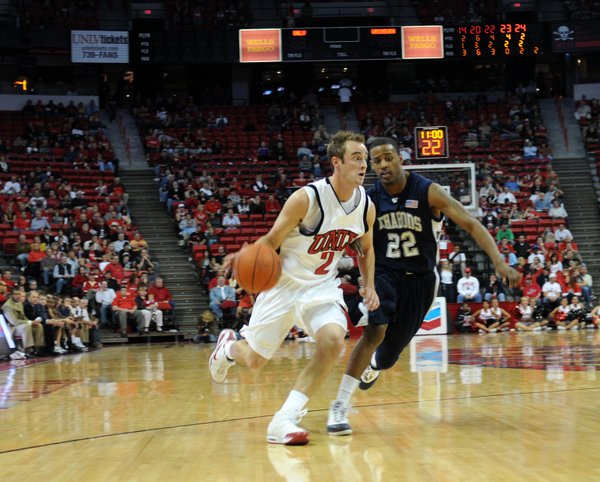 Kendall Wallace drives past the Washburn defense.