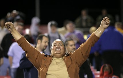 A Rebels fan cheers on the team Thursday night as UNLV defeats Wyoming. 